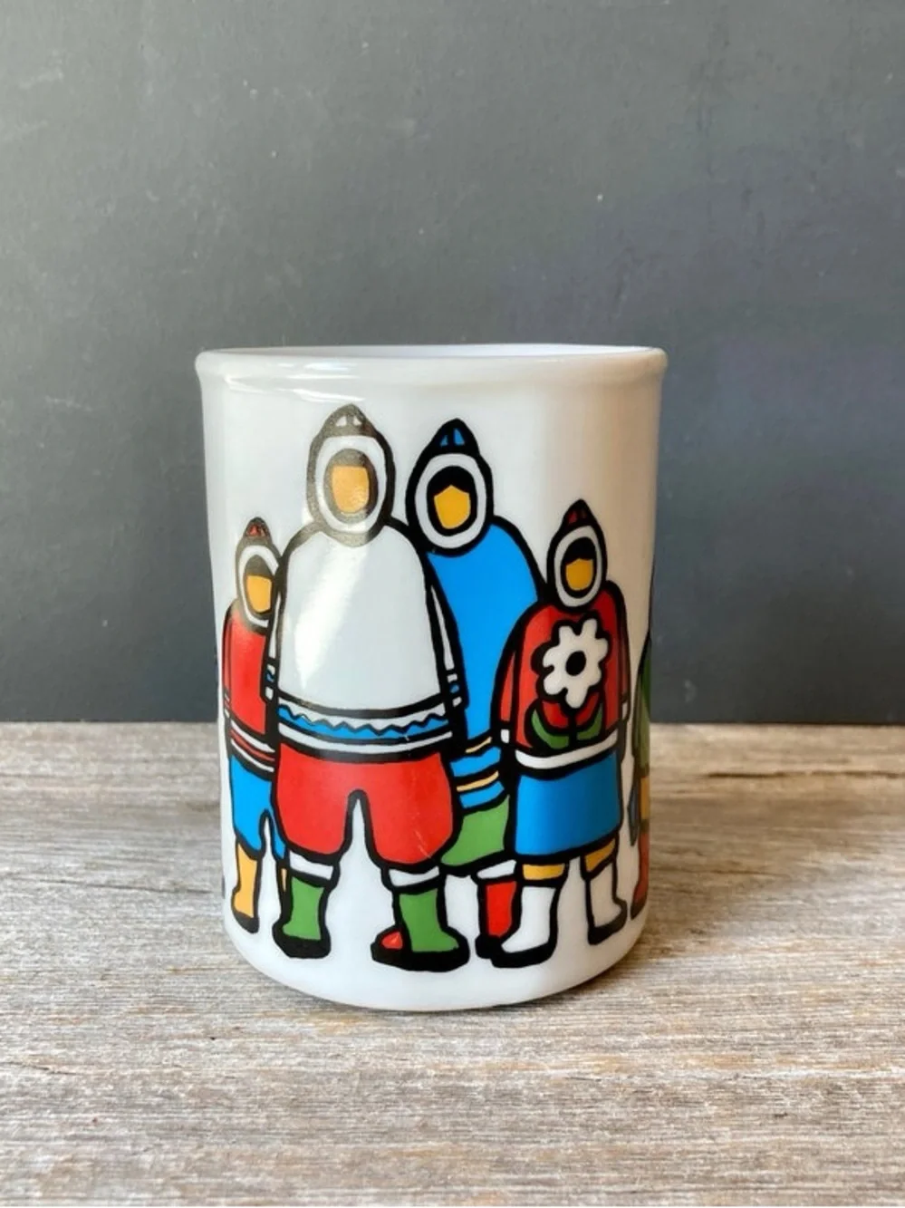 Marc Tetro coffee mug featuring Inuit family artwork by Danesco.